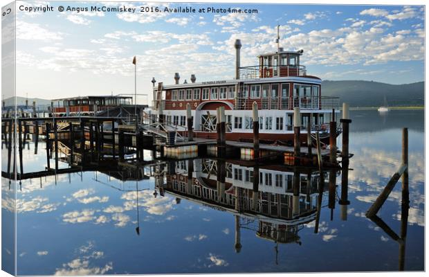 Paddle cruiser on old jetty at Knysna Canvas Print by Angus McComiskey