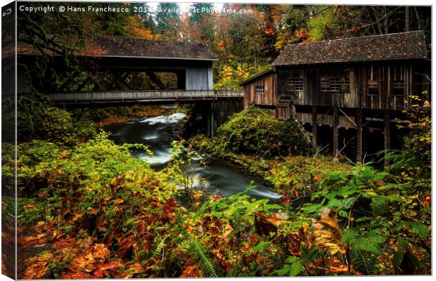 The mill by the covered bridge Canvas Print by Hans Franchesco