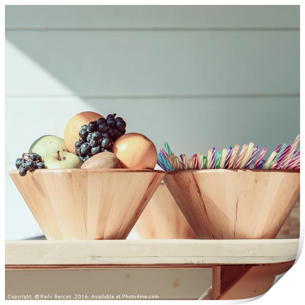 Fruit Bowl And Colorful Straws On Table Print by Radu Bercan