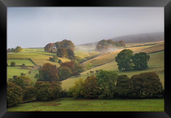 Autumnal hillside in the Derwent valley Framed Print by Andrew Kearton