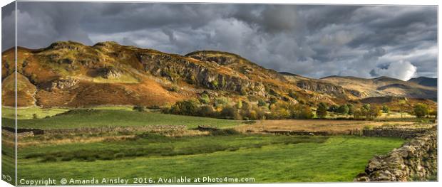 Sunlight On The Cumbrian Fells Canvas Print by AMANDA AINSLEY