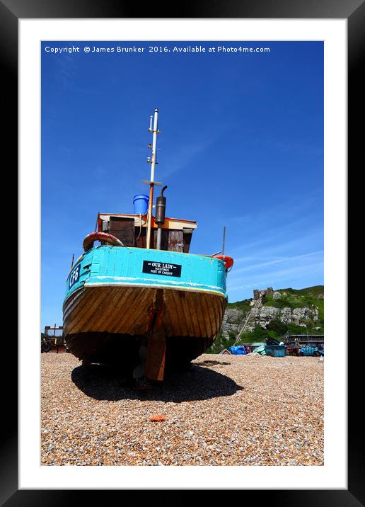 Fishing boat on the beach at Hastings Framed Mounted Print by James Brunker