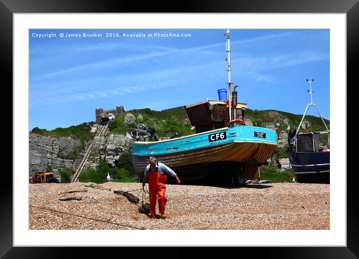 Fisherman at work Hastings East Sussex Framed Mounted Print by James Brunker