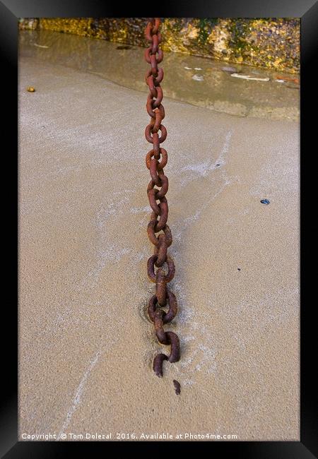 Chain in the sand Framed Print by Tom Dolezal