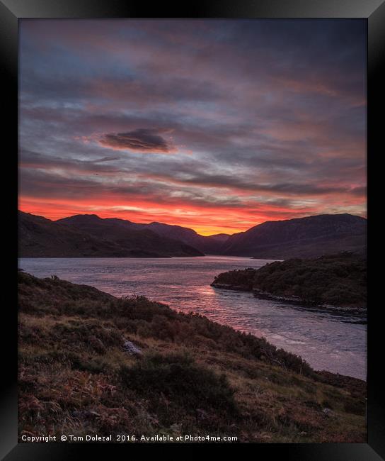 Red Highland sunrise Framed Print by Tom Dolezal