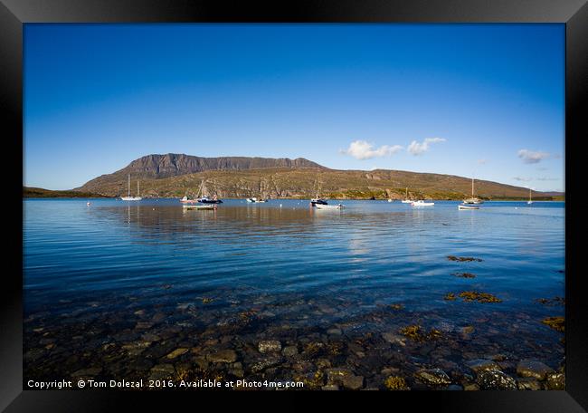 Yachts moored at Loch Canaird Framed Print by Tom Dolezal
