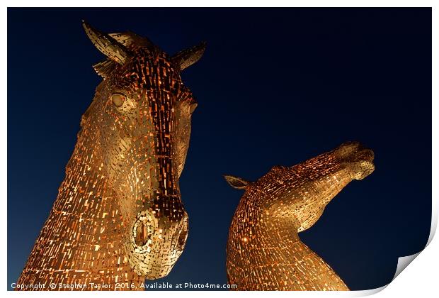 The Kelpies lit orange Print by Stephen Taylor