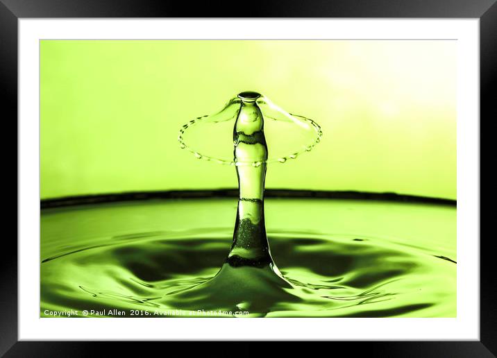 water drop collision in green. Framed Mounted Print by Paul Allen