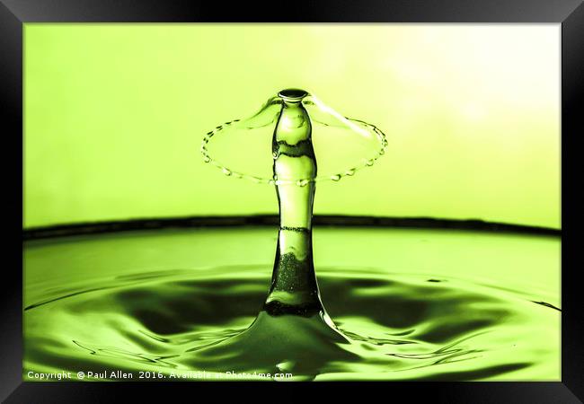 water drop collision in green. Framed Print by Paul Allen