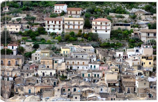 Sicilian hillside houses Canvas Print by Gwil Roberts