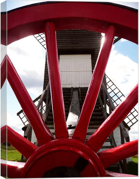 Pitstone Windmill Through Wheel Canvas Print by Ian Jeffrey