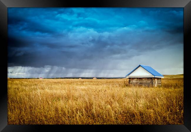 Hut and Rain Framed Print by John Williams