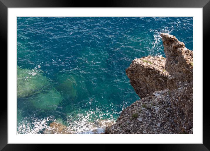 Rocks in the sea Framed Mounted Print by Ranko Dokmanovic