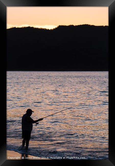 Silhouette of a tico fishing Framed Print by Jason Wells