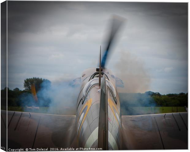 Smoky Spitfire start up. Canvas Print by Tom Dolezal