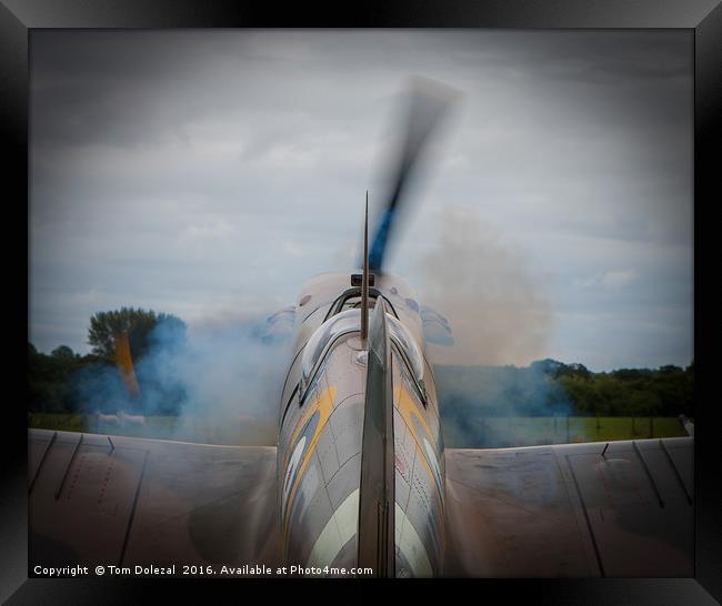 Smoky Spitfire start up. Framed Print by Tom Dolezal