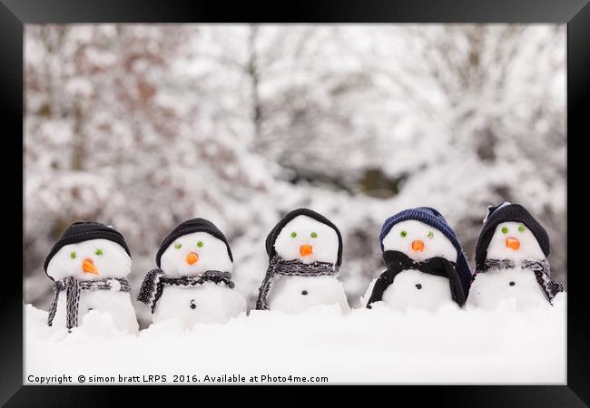 Five cute snowmen facing forward Framed Print by Simon Bratt LRPS