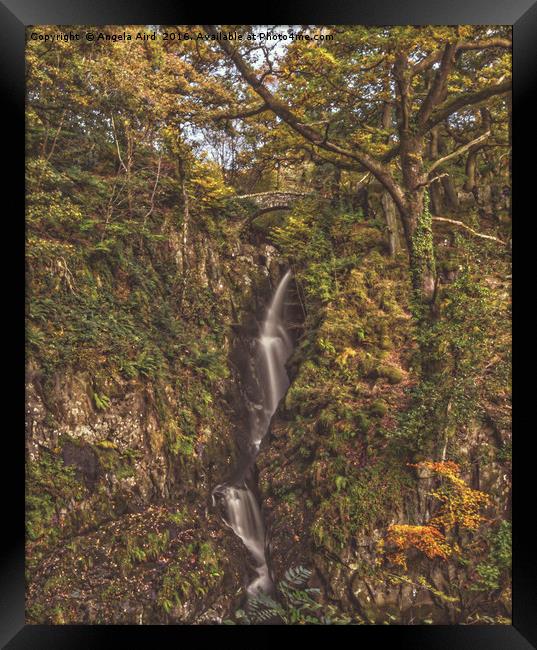 Autumnal Waterfall. Framed Print by Angela Aird