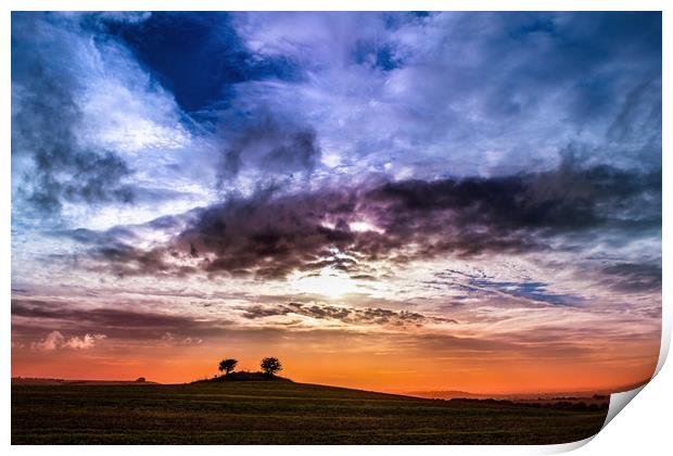 Colourful cloudy sky sunset behind a small hill Print by André Jorge