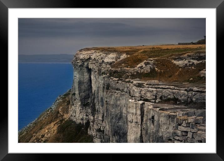 Climbing a coast cliff foggy weather aerial view Framed Mounted Print by André Jorge