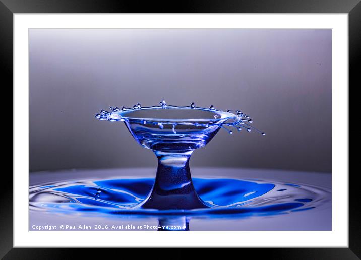 Blue bowl shaped water drop collision Framed Mounted Print by Paul Allen