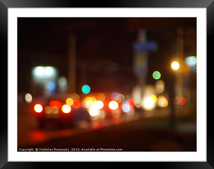 Abstract blur image of a night scene with bright l Framed Mounted Print by Vladislav Romensky