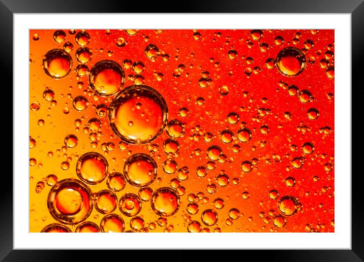 Red and Orange Coloured Oil on Water Abstract Framed Mounted Print by John Williams