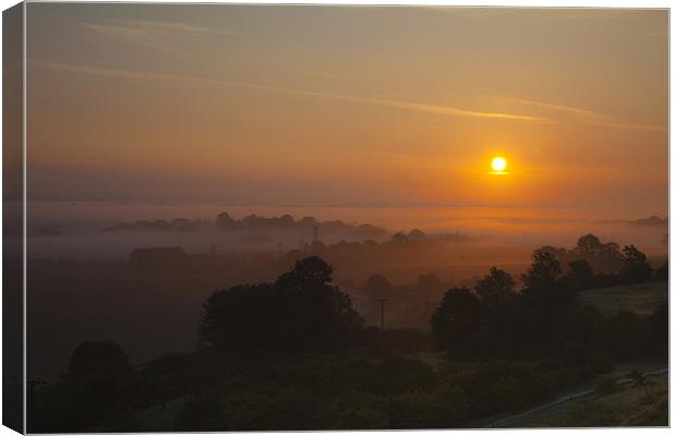 Sunrise From The Sugar Lump Canvas Print by Nigel Coomber