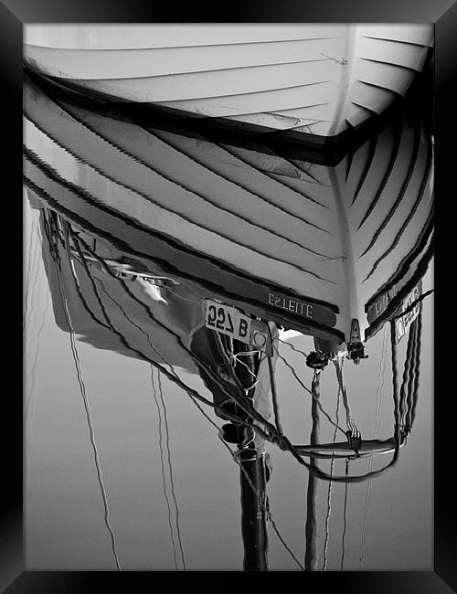 Boat Reflection Framed Print by Paul Macro