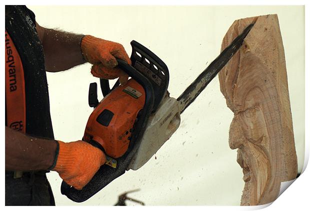 Wood carving with a chainsaw Print by Chris Day