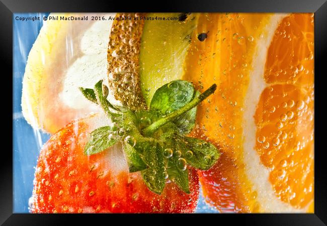 A strawberry, orange, kiwi and lemon cocktail Framed Print by Phil MacDonald