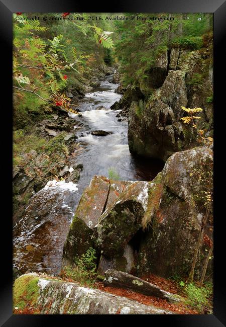 WATER AND ROCKS Framed Print by andrew saxton