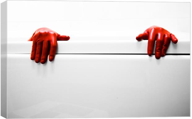 Red gloves Canvas Print by Simon Thorpe
