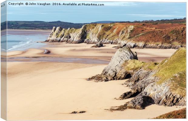 Three Cliffs Bay and Great Tor from Shire Combe Canvas Print by John Vaughan
