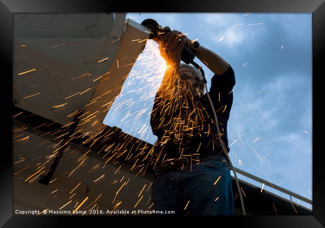 Muliple sparks during metal cutting Framed Print by Massimo Lama