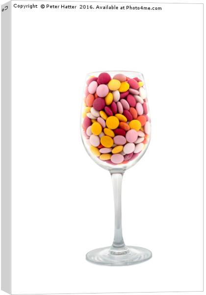 Wine glass and candy Canvas Print by Peter Hatter