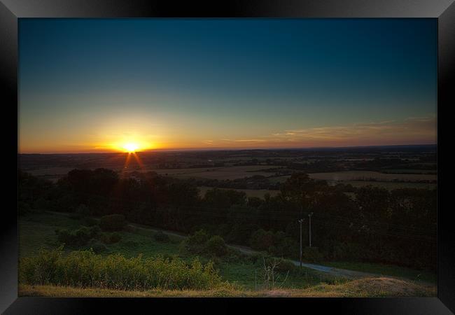 Sunset on the Downs Framed Print by Nigel Coomber