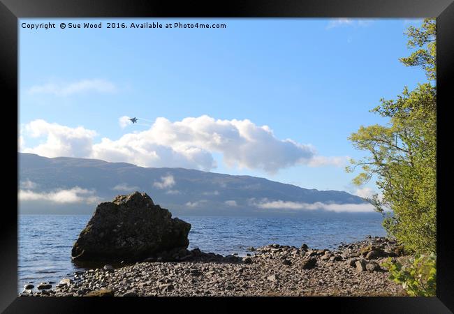 Fighter jet over Loch Ness Framed Print by Sue Wood