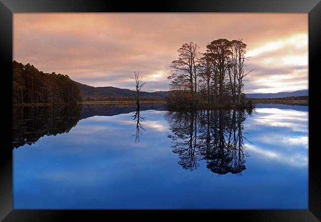 Sunset over Loch Framed Print by Michael Hopes