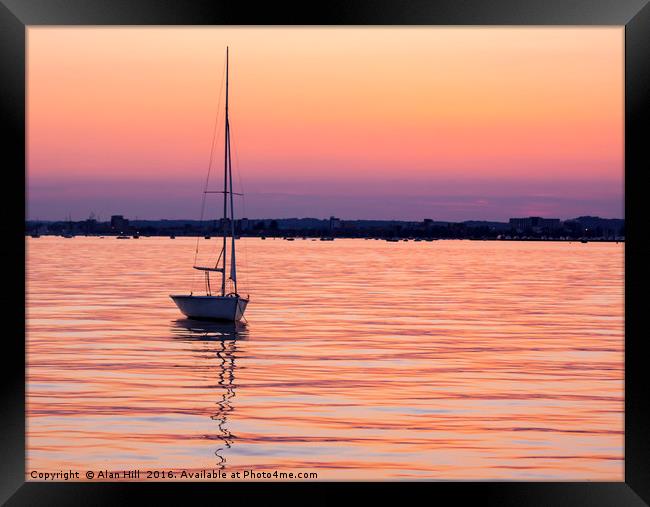 Orange and purple sunset over Poole Harbour Framed Print by Alan Hill