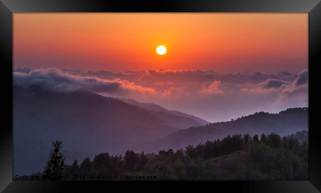 Sunset above clouds at altitude in Troodos Montain Framed Print by Alan Hill