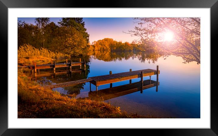 Wooden Jetties on a Becalmed Lake at Sunset Framed Mounted Print by Alan Hill