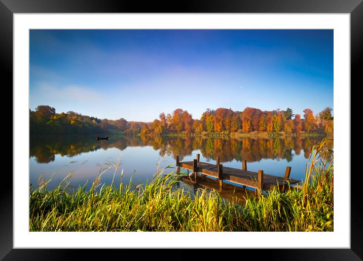 Still waters of a lake in autumn Framed Mounted Print by Alan Hill