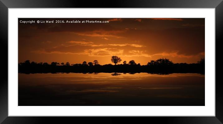 Reflective sunset Framed Mounted Print by Liz Ward