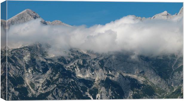  Mountain in the clouds Canvas Print by Ranko Dokmanovic