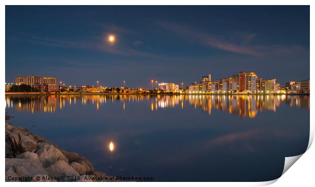 The moon and cityscape lights, reflect off harbour Print by Alan Hill