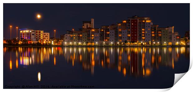 The moon and cityscape lights, reflect off harbour Print by Alan Hill