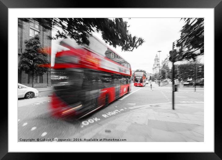 Red double-decker bus on the street of London Framed Mounted Print by Łukasz Szczepański