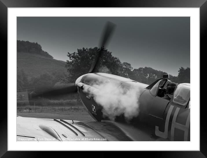 Smoky Spitfire start up. Framed Mounted Print by Tom Dolezal