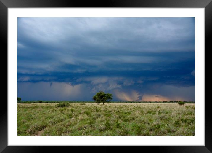 Stormy skies over Africa Framed Mounted Print by Jane Thomas